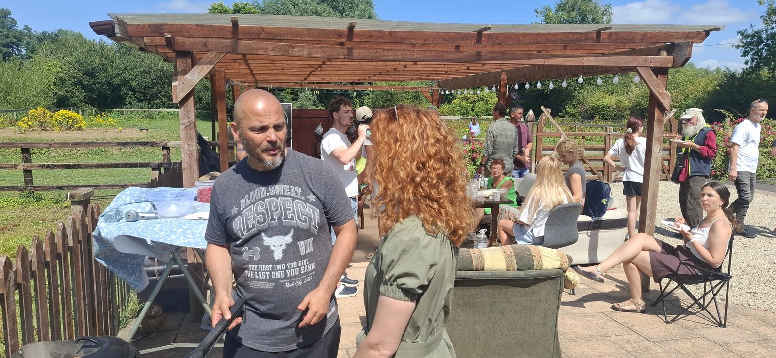 Guests chatting on the terrace at the picnic